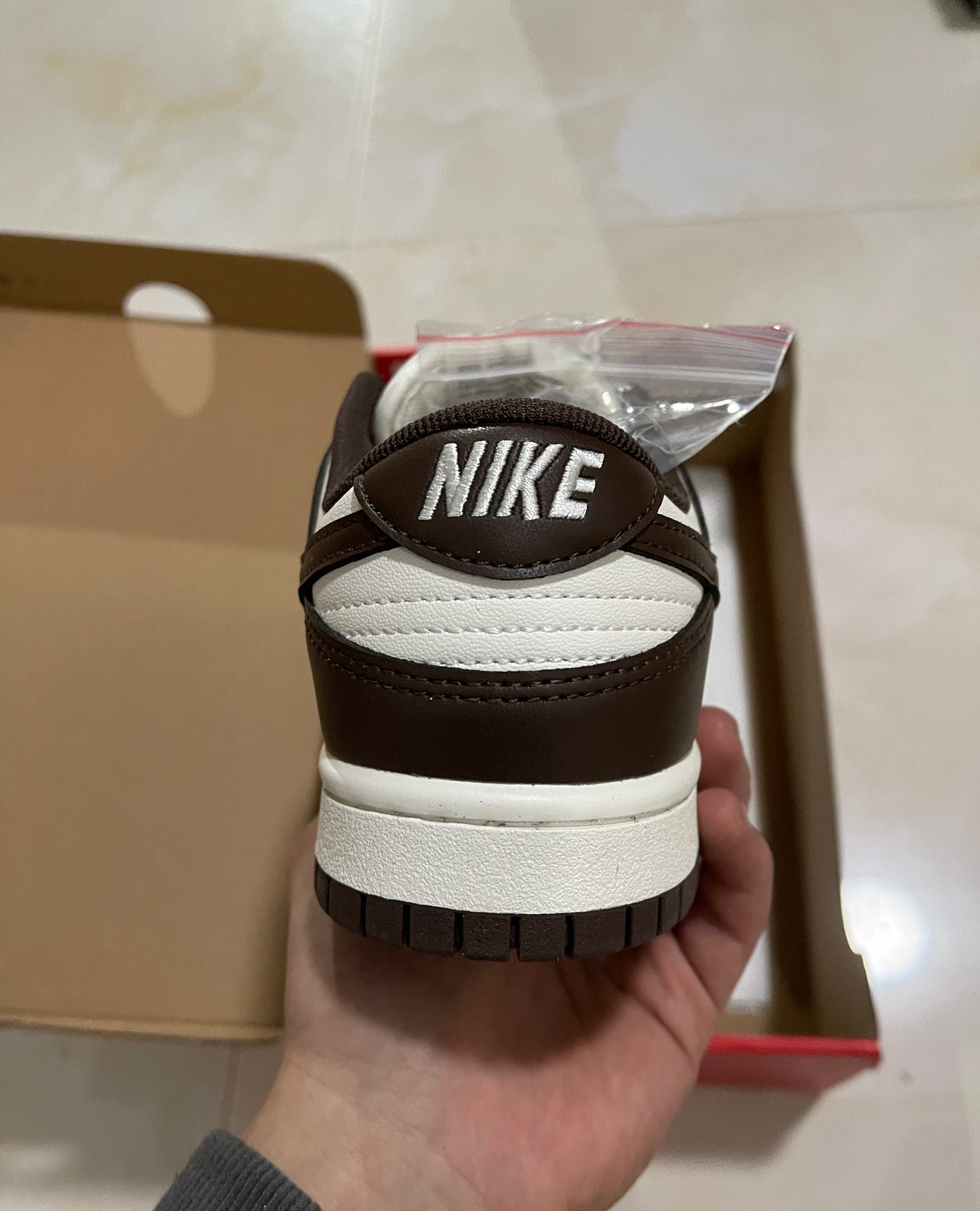 A Nike SB Dunk - Surfaces in Brown