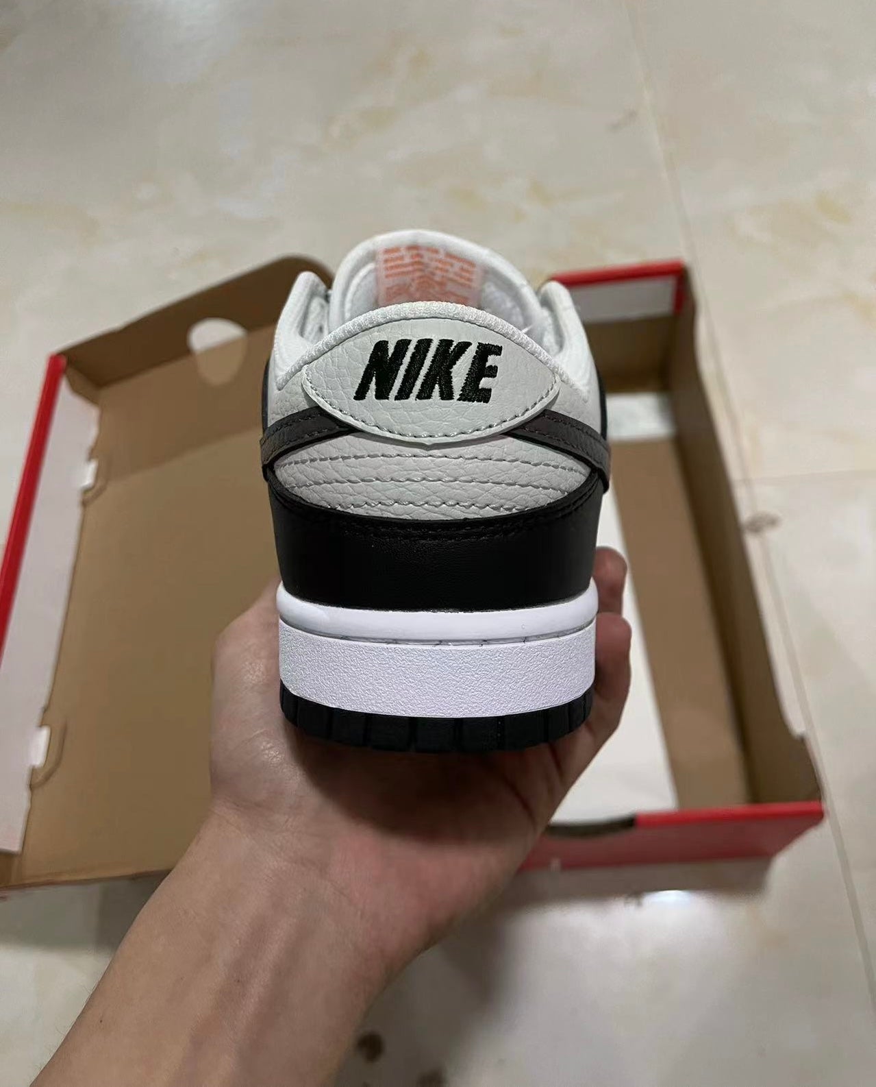 A Nike SB Dunk- Bright Mandarin mini Swoosh