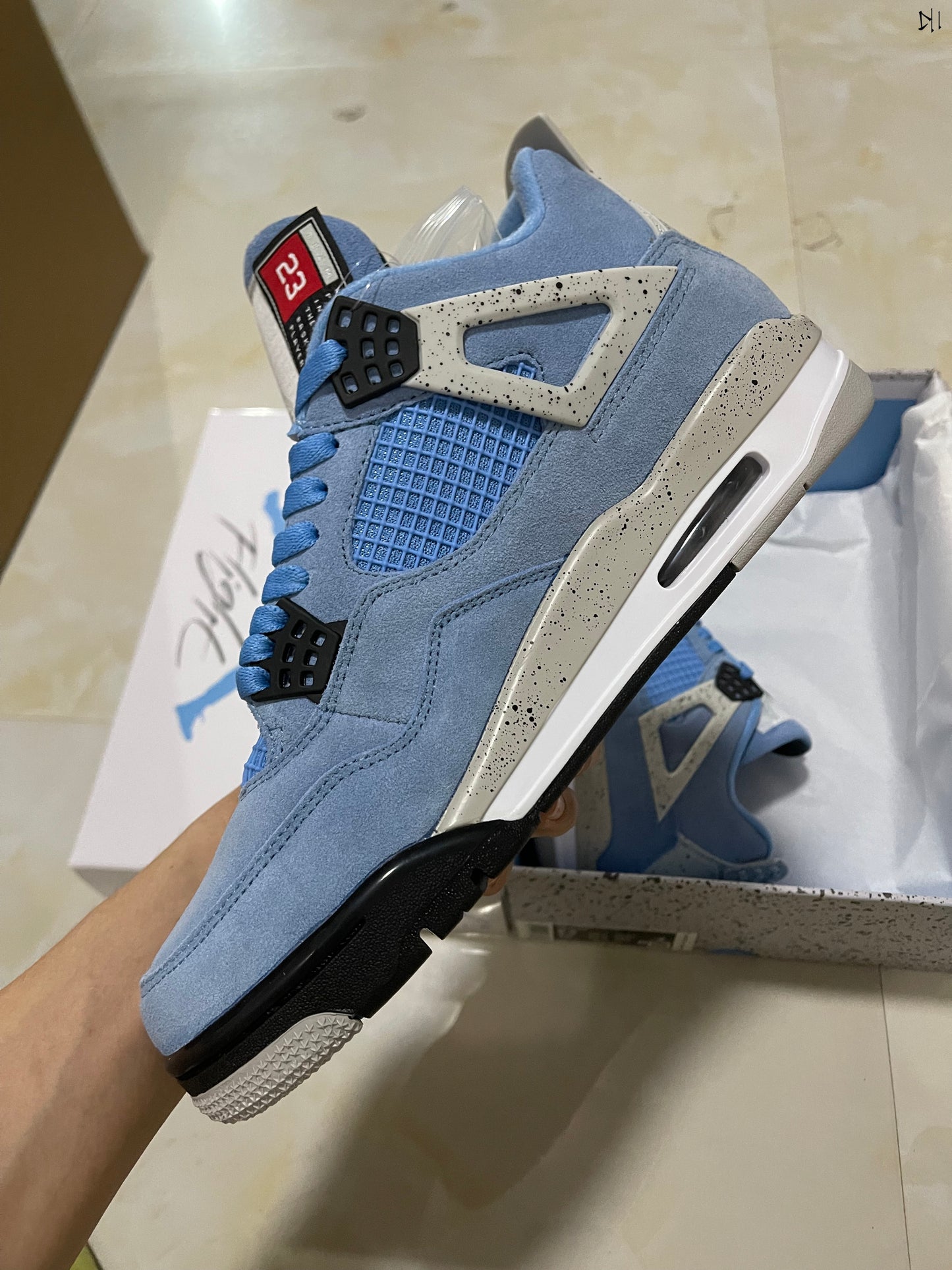Jordan 4 - University Blue