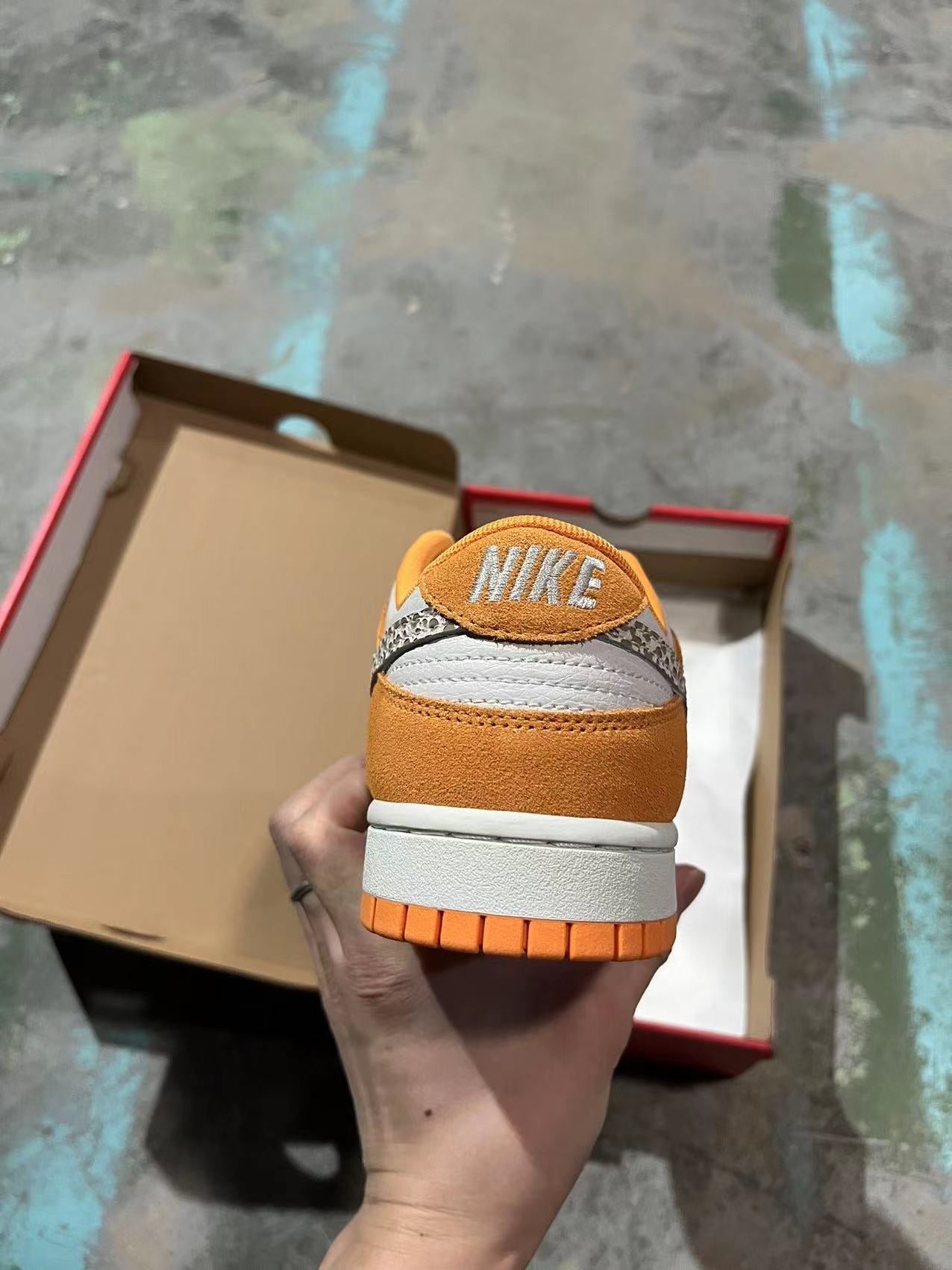 A Nike SB Dunk - Safari Swoosh Orange