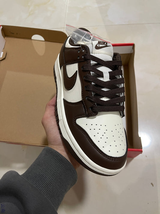 A Nike SB Dunk - Surfaces in Brown