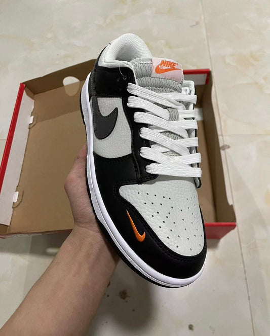 A Nike SB Dunk- Bright Mandarin mini Swoosh