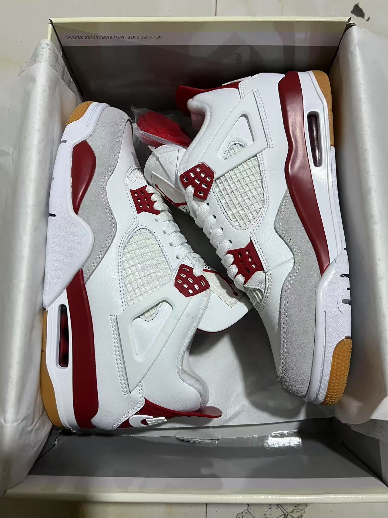 A Nike SB x Jordan 4- Varsity Red